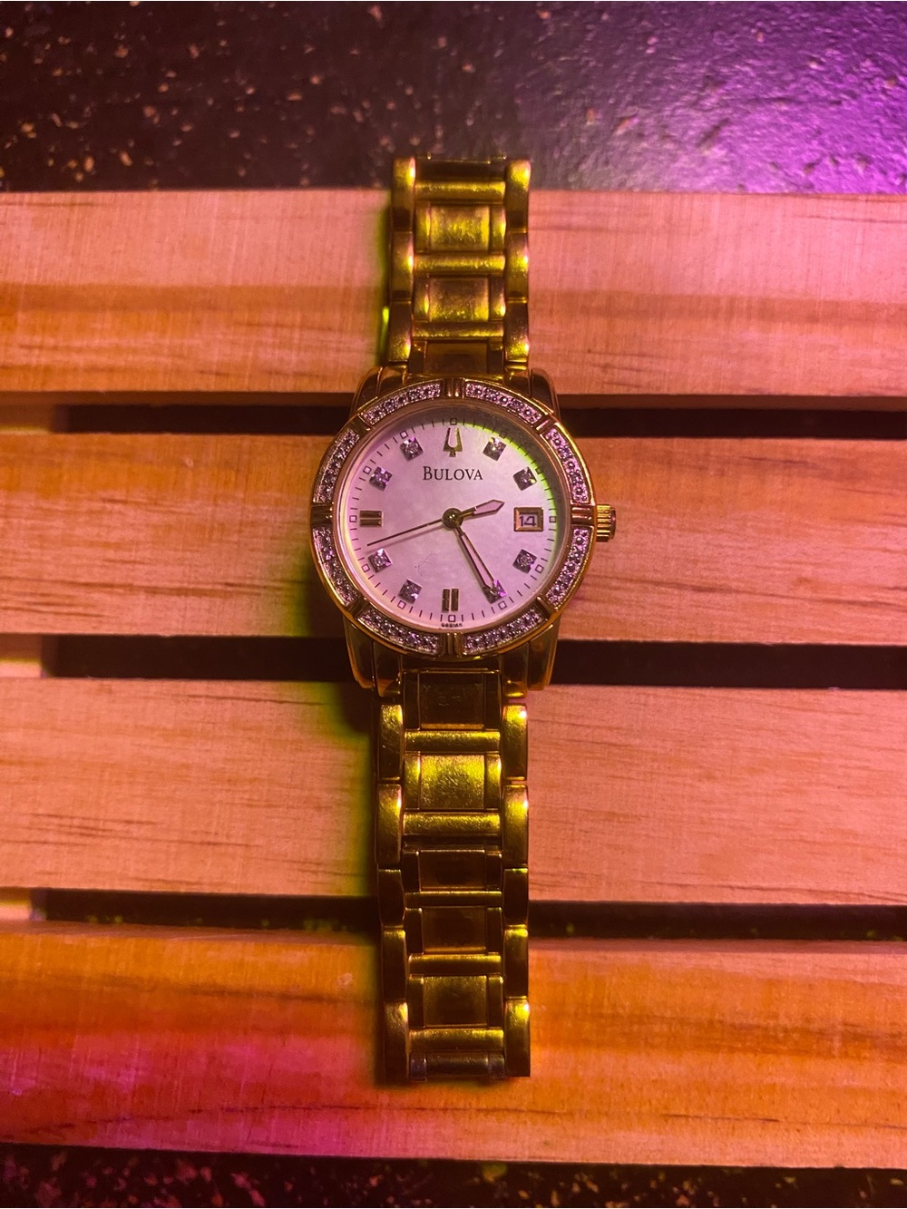 Bulova Gold-Tone Watch with White Dial and Crystal Accents